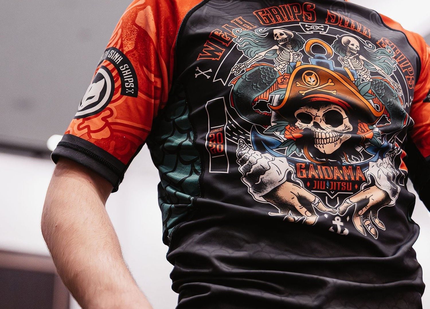Close-up of a fully sublimated rashguard print showing the ink integrated smoothly into the fabric weave with no raised texture