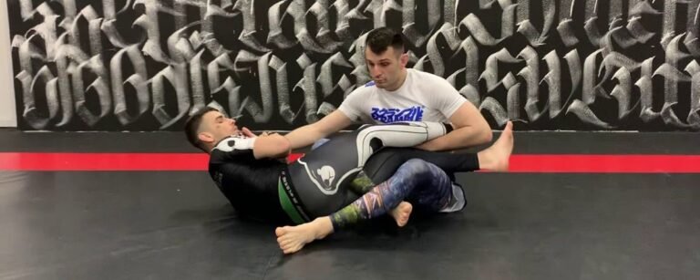 Saddle position no-gi leg lock control with both legs figure-foured around the trapped knee