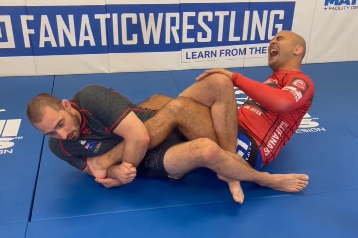 No-gi grappler finishing an inside heel hook from the saddle position