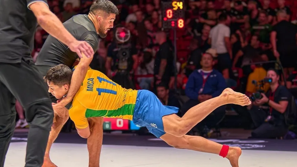 No-gi grapplers exchange a takedown attempt in a submission wrestling match
