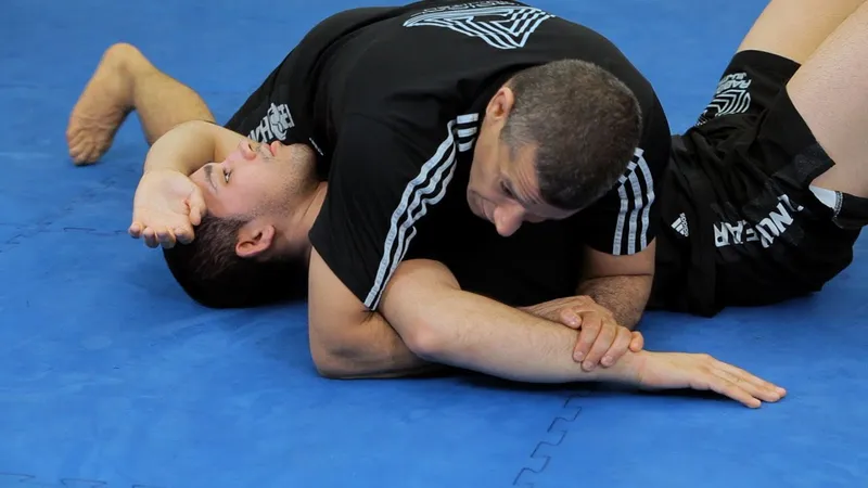 No-gi kimura grip finish off a half guard sweep chain