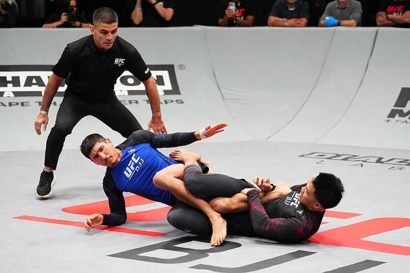 Jalen Fonacier finishing a heel hook submission in UFC BJJ bantamweight action