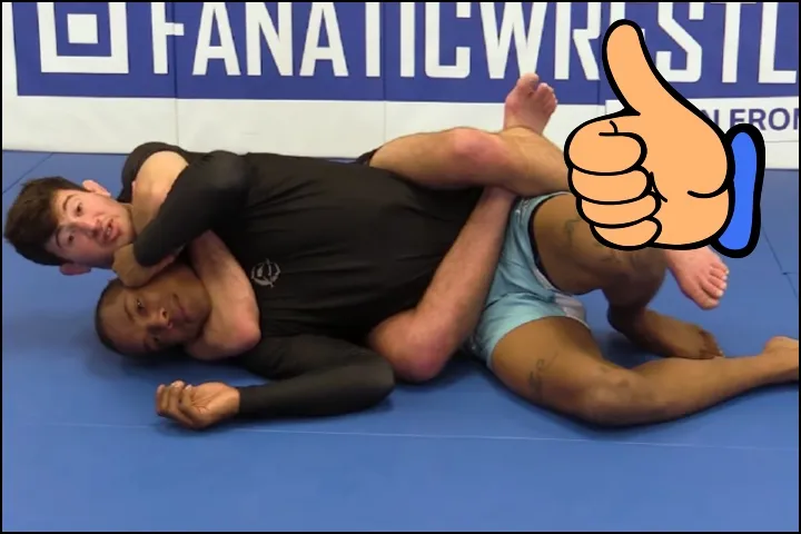 No-gi grappler finishing the rear naked choke off the gift wrap back take