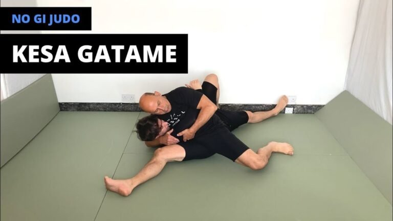 No-gi kesa gatame scarf hold position demonstrated without a gi