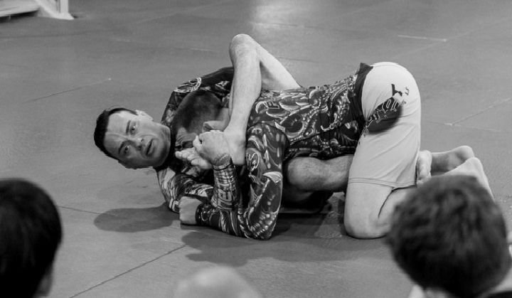 Control position mechanics that apply to protecting a training partner's shoulder during reverse omoplata drilling