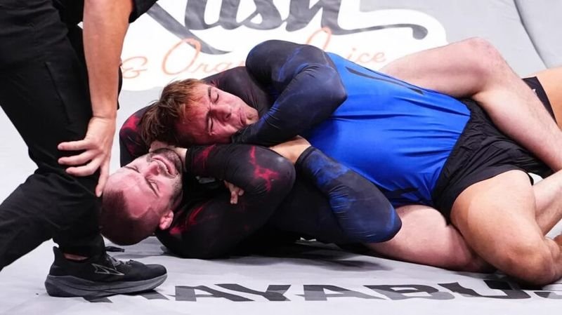 William Tackett locks in the rear-naked choke on Jay Rodriguez at UFC BJJ 13